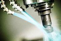 Metalworking fluid additive